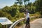 cyclist takes pictures on the coast