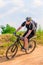 Cyclist wearing a helmet on a mountain bike