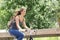 Cyclist woman riding bicycle in a park