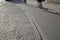 Cyclists on Cobblestone Street; Christianshavn; Copenhagen