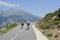 Cyclists on mountain road in Corsica, France