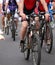 cyclists pedal quickly through the streets during the sporting e