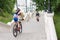 Cyclists riding down a long flight of stairs