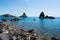 Cyclops islands, Acitrezza, Sicily. Basalt  rocks on the sea