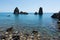 Cyclops islands, Acitrezza, Sicily.  Basalt rocks on the sea