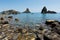 Cyclops islands, Acitrezza, Sicily. Basalt  rocks on the sea