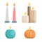 Cylinder-shaped aromatic burning wax candles, brown shades, orange pumpkin, pink spiral, blue ball, gray teardrop.