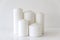 Cylinder Shaped White Candles On White Background