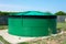 Cylindrical water storage tank.