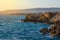 Cyprus coastline. Mediterranean rocky seashore at sunset. Travels and vacations concept