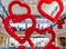 Cyprus - February, 2020: Valentine`s day decor red balloons in the shape of hearts in shopping mall hanging from the