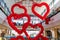 Cyprus - February, 2020: Valentine`s day decor red balloons in the shape of hearts in shopping mall hanging from the