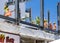 CYPRUS, Kyrenia - JUNE 10, 2019: Builders are building a new building on the roof. Workers dressed in orange vests and yellow