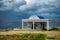 Cyprus, the Mediterranean coast. Church of Agia Anargiri on Cape Greco against the background of a summer storm sky