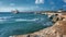 Cyprus, Paphos. Shipwreck. The ship crashed on the coastal rocks. Rusty ship at the shore of the Mediterranean sea. Tourist