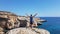 Cyprus - Young man admiring the blue lagoon