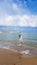 Cyprus - Young woman jumping in the sea