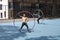 Cyr wheel gymnasts on the street in Brooklyn, New York City