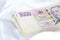 Czech banknotes thousand money currency on white satin fabric