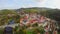 Czech Castle moat colorful buildings, old medieval island aerial