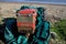 Czech communist era Zetor tractor on Saltburn beach wrapped in green oilskins