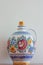 A Czech folklore vase hand painted with flowery motives