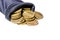 Czech gold coins in a black bag on a white background