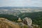 Czech landscape with big stone above Liberec city viewed from Jested hill at summer evening sunset 50 years after soviet occupatio