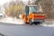 CZECH REPUBLIC, PLZEN, 7 MAY, 2016:Asphalt spreading machine and vibration roller at pavement road works.