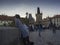 Czech Republic, Prague , September 8, 2018: Young couple standing on Charles Bridge with View on Mala Strana Bridge Tower with wal