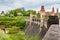 Czech republic, Talsperre Les Kralovstvi Forest Kingdom - May 15, 2021. Historic hydraulic water dam with orange water in river