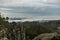 Czech sandstone rocks in clouds