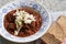 Czech style beef goulash served in rustic deep plate.