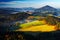 Czech typical autumn landscape. Hills and villages with foggy morning. Morning fall valley of Bohemian Switzerland park. Hills wit