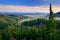 Czech typical forest landscape. Hills and villages in summer morning. Morning fall valley of Bohemian Switzerland park. Hills with