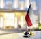 Czechia flag on the reception desk in the lobby of the hotel