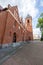 Czersk, Pomorskie / Poland - September, 11, 2020: Catholic Church in the center of a small town in Pomerania. Brick Christian