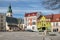 Czluchow, pomorskie / Poland - March, 31, 2019:  The market of a small town in Central Europe. Church and tenements in the city