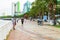 Da Nang, Vietnam - JUNE 23 , 2019: The Han River embankment. The empty cobblestone sidewalk with street lights, the handrail,