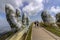 Da Nang, Vietnam - October 31, 2018: Tourists in Golden Bridge, a pedestrian footpath lifted by two giant hands, open in July 2018