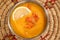 Daal lentil Soup with lemon served in bowl isolated on background top view arabic style