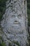 Dacian Decebal s king face near Cazane on the Danube