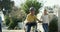 Dad, child and teaching bicycle ride for safety, helmet and outdoor street with sister. Cycling, childhood memory and