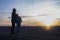 Dad and daughter. Against the background of the sunset and mountains. father\\\'s day Dad hugs the children. Family