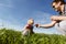 Dad and daughter blow bubbles