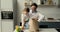 Dad and daughter unpack fresh natural vegetables from paper bag