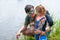 Dad with his little daughter by the river,father hugs his baby,parental love