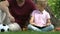 Dad and kid reading book, father explaining difficult items to son, education