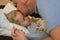 dad kisses his sick child on the forehead before bed. Father with tenderness and care kisses his daughter. the concept