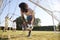 Dad saving goal during multi generation family football game